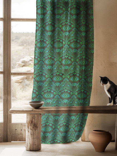 Luminous whispers of emerald sway gently, catching the light like precious jewels suspended in time. Our Guardian Eye Sheer Curtain Panel transforms ordinary windows into portals of protection and refined elegance. Vivid jewel-toned eyes nestled among flourishing botanical motifs create a mesmerizing pattern against the dark background, offering both visual intrigue and symbolic resonance within your sanctuary.
Designed for spaces that demand both statement and subtlety, this panel excels in studies, living